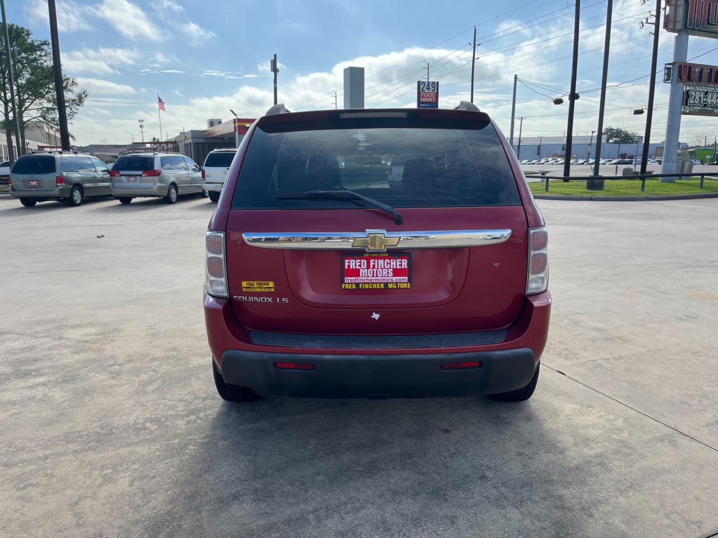 2006 red /TAN Chevrolet Equinox LS 2WD (2CNDL13F366) with an 3.4L V6 OHV 12V engine, 5-Speed Automatic transmission, located at 14700 Tomball Parkway 249, Houston, TX, 77086, (281) 444-2200, 29.928619, -95.504074 - Photo#5